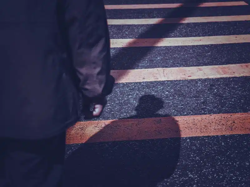 Rearview of a man crossing the road. pedestrian accidents on the Las Vegas Strip
