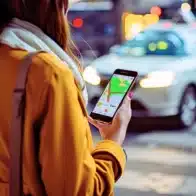 Young woman calling crowdsourced taxi. Uber and Lyft Accidents on The Strip